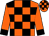 Orange , black checks , orange sleeves with black cuffs (Cecil Clugston)