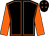 Black, orange seams, orange sleeves, orange stars on cap (D L Mccammon)