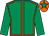 Emerald green, orange seams, emerald green sleeves, orange cap, emerald green star (Mrs Joan Brosnan)