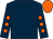 Dark blue, orange spots on sleeves, orange cap (The Jeremy Partnership)