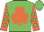 Green, orange shamrock, green spots on orange sleeves, green cap
