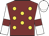 Maroon, gold spots, maroon armlets on white sleeves, white cap