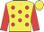 Yellow, red dots, red sleeves, yellow cap